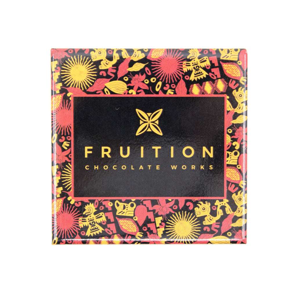 Square magnet with red, black, and gold peruvian style pattern. In the center is a black square that reads "fruition chocolate works"