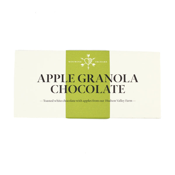 white chocolate bar wrapper with a green vertical stripe down the center. The text reads "apple granola chocolate: toasted white chocolate with apples from our hudson valley farm"